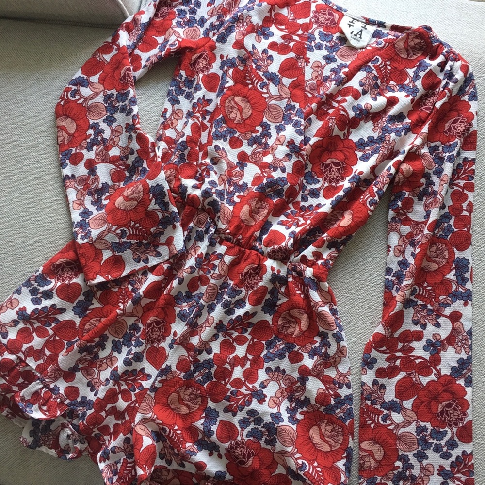 Red ruffle floral romper